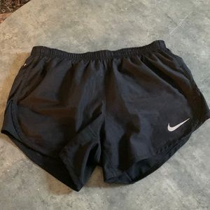 Black Nike running shorts